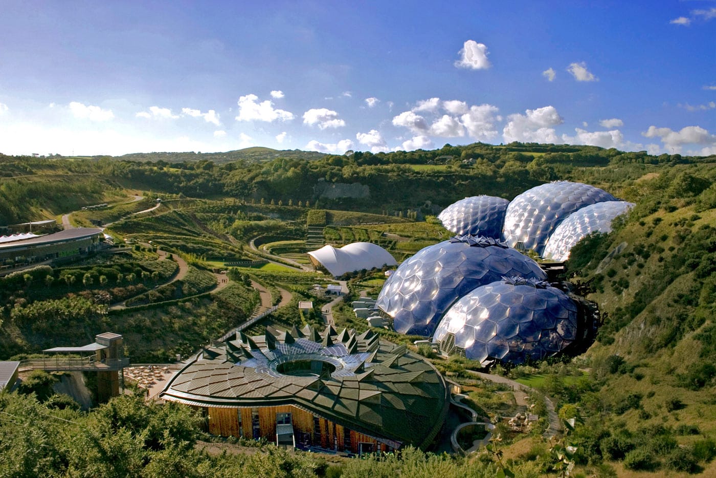 The biomes at the Eden Project under a bright blue sky