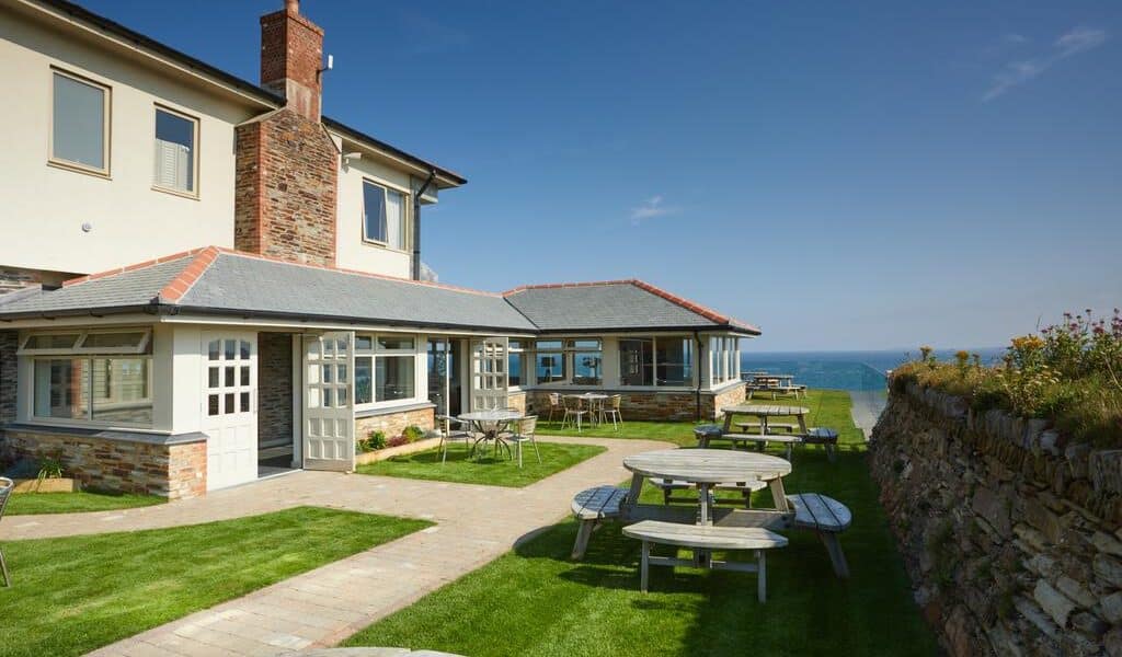 There is plenty of outdoor eating space at the Lewinnick Lodge to enjoy the clifftop setting