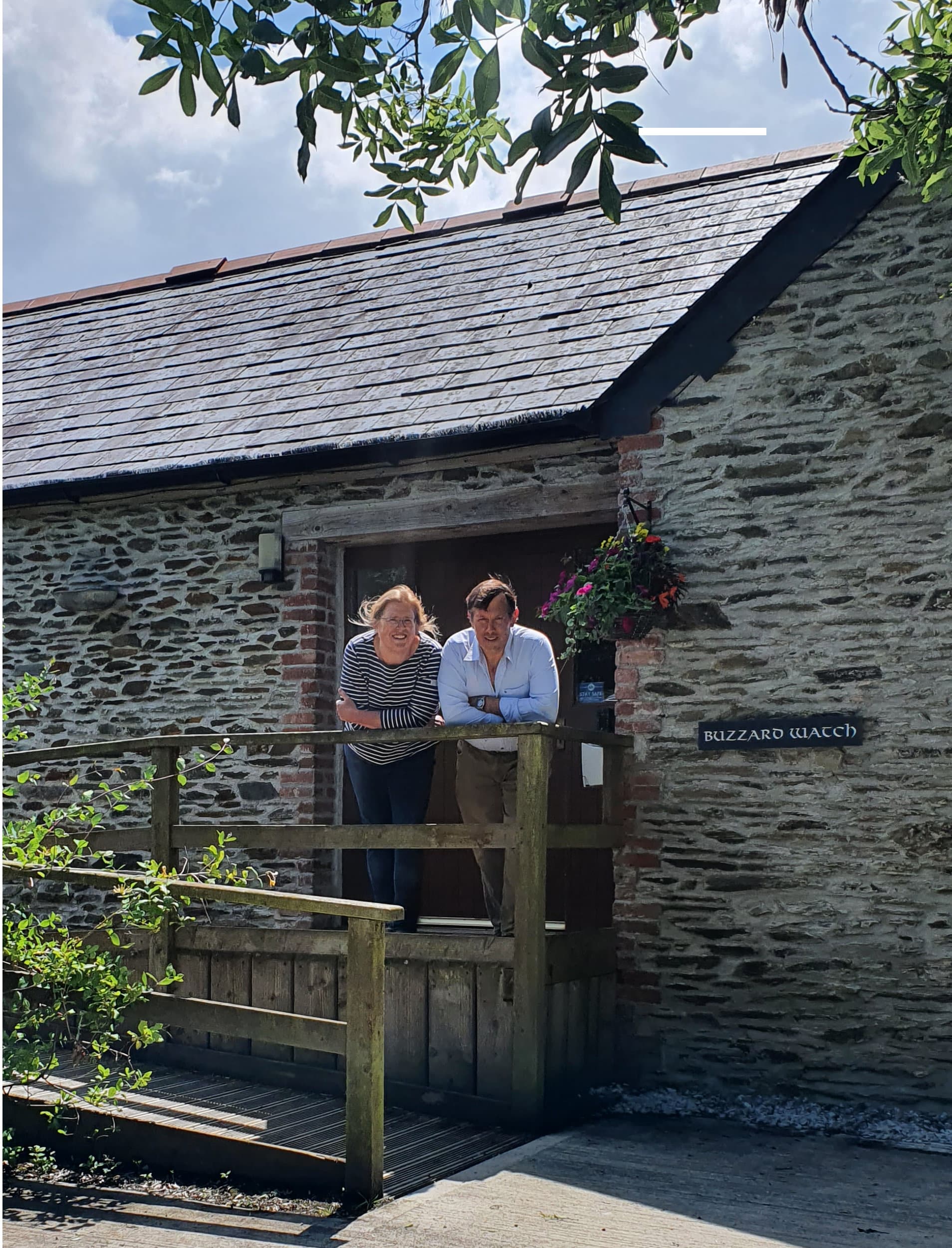 Stood at the top of the wheelchair ramp of Buzzard Watch are David and Esme