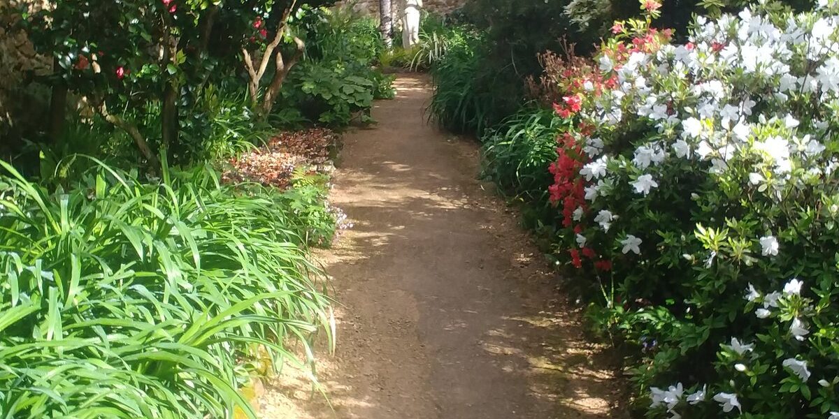 Sculpture amongst greenary at Trewithen Gardens