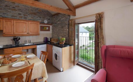 The reverse level living area has french doors that enhances the airy feel